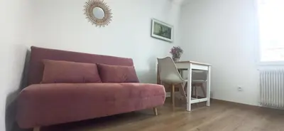 Coin salon dans l'établissement Appartement T2 au 1er étage