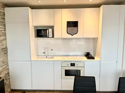 Cuisine ou kitchenette dans l'établissement L'Ange Au Sourire