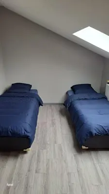 Un ou plusieurs lits dans un hébergement de l'établissement maison pas loin centre-ville