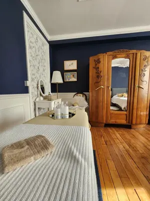 Un ou plusieurs lits dans un hébergement de l'établissement Cosy Art Gallery