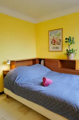 Un ou plusieurs lits dans un hébergement de l'établissement Maison au cœur des vignes