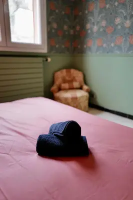Un ou plusieurs lits dans un hébergement de l'établissement Maison au cœur des vignes