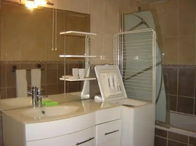 Salle de bains dans l'établissement appt 2 pièces près de Disney