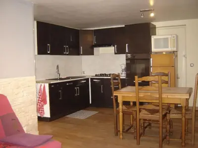 Cuisine ou kitchenette dans l'établissement appt 2 pièces près de Disney