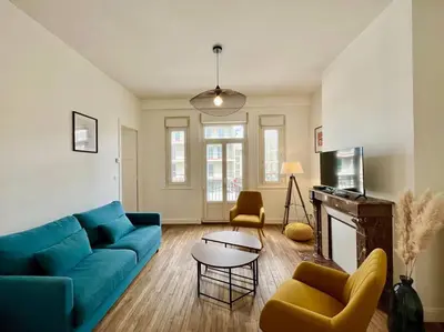 Coin salon dans l'établissement Suite Montoison Reims