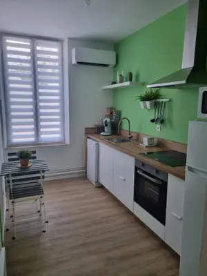 Cuisine ou kitchenette dans l'établissement La Cigale