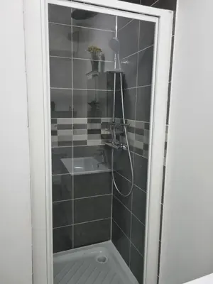 Salle de bains dans l'établissement La Cigale