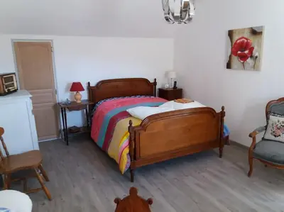 Un ou plusieurs lits dans un hébergement de l'établissement Gîte la Grange