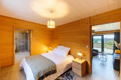 Un ou plusieurs lits dans un hébergement de l'établissement Cottage 3 chambres - Chaleureux chalet pour 6