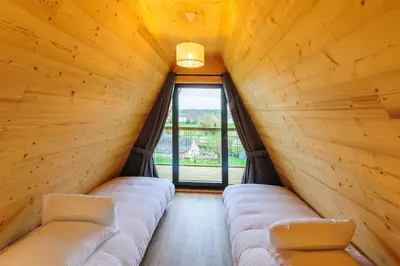 Coin salon dans l'établissement Cottage 3 chambres - Chaleureux chalet pour 6