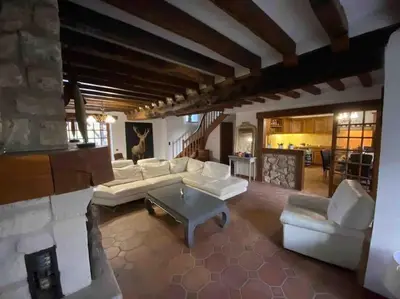 Un ou plusieurs lits dans un hébergement de l'établissement MAISONS - SAUNA, HAMMAN ET PISCINE. FÊTES INTERDIT