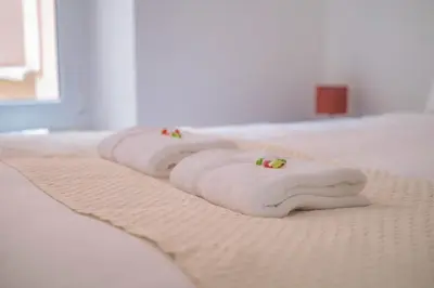 Un ou plusieurs lits dans un hébergement de l'établissement Le Boulingrin - 4 apartments