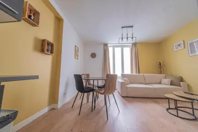 Coin salon dans l'établissement Le Boulingrin - 4 apartments