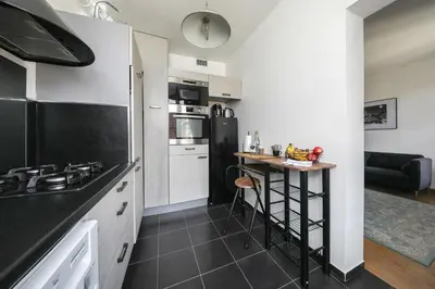 Cuisine ou kitchenette dans l'établissement Charmant Appartement dans le centre ville, à 2 minutes du Palais