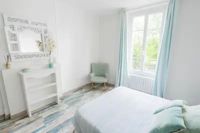 Un ou plusieurs lits dans un hébergement de l'établissement Bel appartement à 10 minutes de Disney