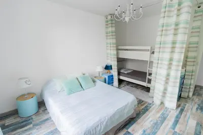 Un ou plusieurs lits dans un hébergement de l'établissement Bel appartement à 10 minutes de Disney