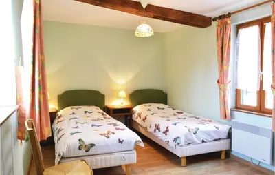 Un ou plusieurs lits dans un hébergement de l'établissement Holiday Home Parfondeval St-1184