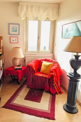 Coin salon dans l'établissement Maison entière et spacieuse Gîte Dovie