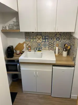 Cuisine ou kitchenette dans l'établissement Maison de charme