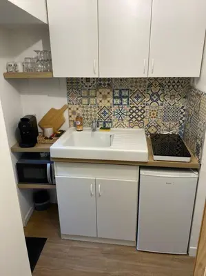 Cuisine ou kitchenette dans l'établissement Maison de charme