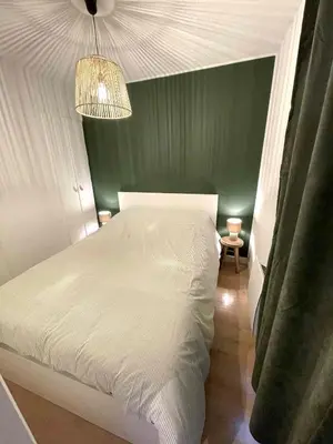 Un ou plusieurs lits dans un hébergement de l'établissement Gîte au calme en pleine nature
