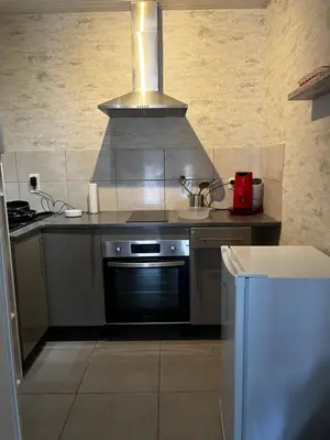 Cuisine ou kitchenette dans l'établissement Appartement 29E à Mailly-le-camp