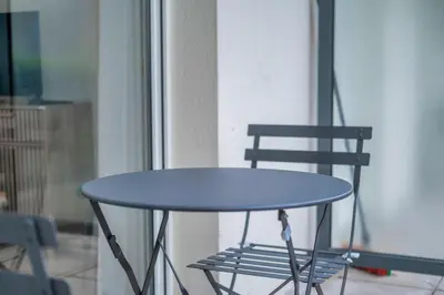 Télévision ou salle de divertissement dans l'établissement Studio Boulingrin - Hypercentre