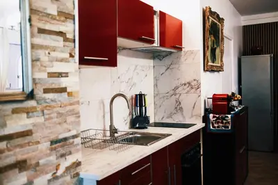 Cuisine ou kitchenette dans l'établissement L'Alouette - Appartement 60m2 PMR