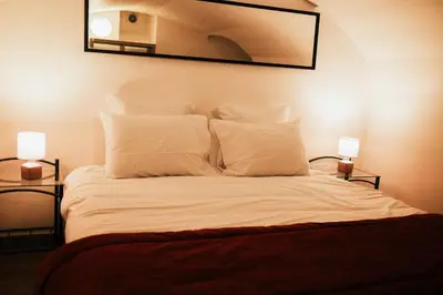 Un ou plusieurs lits dans un hébergement de l'établissement La Chouette - Appartement 70m2 PMR