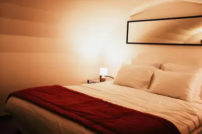 Un ou plusieurs lits dans un hébergement de l'établissement La Chouette - Appartement 70m2 PMR