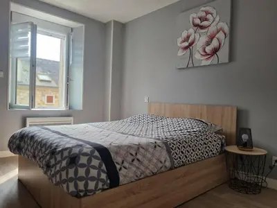 Un ou plusieurs lits dans un hébergement de l'établissement Gite de la Rowa Monthermé