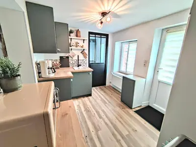 Cuisine ou kitchenette dans l'établissement La petite Flânerie