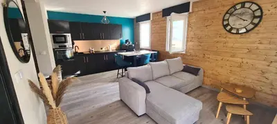 Cuisine ou kitchenette dans l'établissement Appartement joli et spacieux