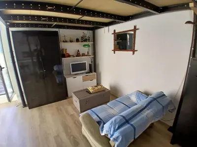 Télévision ou salle de divertissement dans l'établissement bel appart. / résidence de standing / plein centre