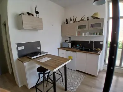 Cuisine ou kitchenette dans l'établissement bel appart. / résidence de standing / plein centre