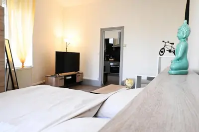Un ou plusieurs lits dans un hébergement de l'établissement Charmant petit pont Ardennais/cosy/T1/wifi/parking