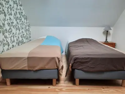 Un ou plusieurs lits dans un hébergement de l'établissement La Petite Maison