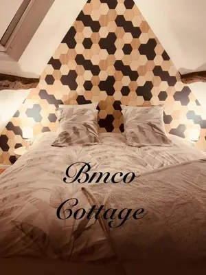 Un ou plusieurs lits dans un hébergement de l'établissement Bmco cottage