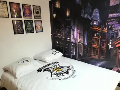 Un ou plusieurs lits dans un hébergement de l'établissement La demeure des maraudeurs -10min Disney-Jardin & BBQ