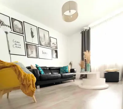 Coin salon dans l'établissement La suite Carolo