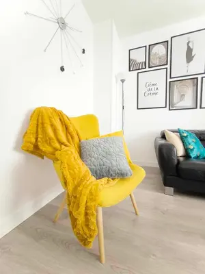 Coin salon dans l'établissement La suite Carolo