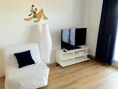 Télévision ou salle de divertissement dans l'établissement Magic Apartments