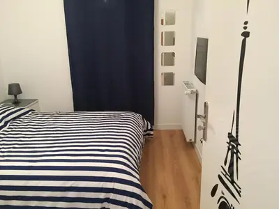 Un ou plusieurs lits dans un hébergement de l'établissement Magic Apartments