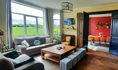 Coin salon dans l'établissement La Villa Beausejour