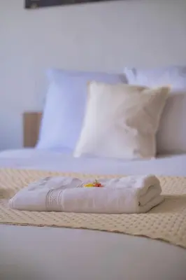 Un ou plusieurs lits dans un hébergement de l'établissement Trioasis - 3 chambres