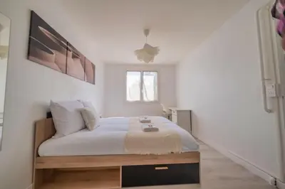 Un ou plusieurs lits dans un hébergement de l'établissement Trioasis - 3 chambres
