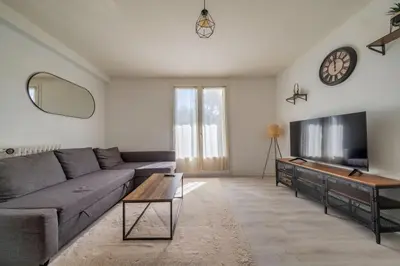 Télévision ou salle de divertissement dans l'établissement Trioasis - 3 chambres