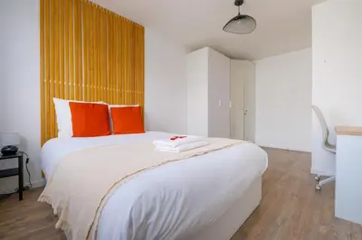 Un ou plusieurs lits dans un hébergement de l'établissement La Rouette - Chambres privées