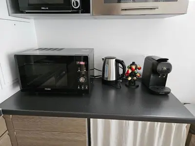 Cuisine ou kitchenette dans l'établissement Lovely Flat