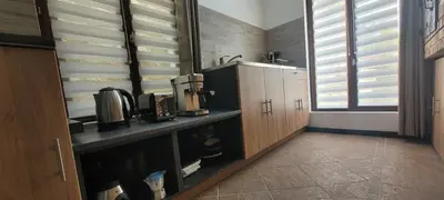 Cuisine ou kitchenette dans l'établissement Chez Philippe et Agnès Appartement T2